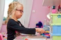 Young schoolgirl doing homework Royalty Free Stock Photo