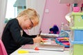 Young schoolgirl doing homework Royalty Free Stock Photo