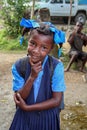 Young schoolgirl poses for a picture from the missionary in rural Haiti.