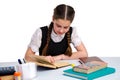 Young schoolgirl in unform studying