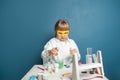 Young scientist child making experiments in his home laboratory. Science child girl Royalty Free Stock Photo