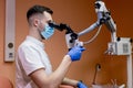 A young scientist conducting research with a microscope. Working with a microscope Royalty Free Stock Photo