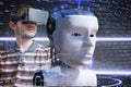 Young scientist is controlling robotic head. Artificial intelligence concept. 3D rendered illustration of a robot Royalty Free Stock Photo