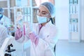 Young scientist holding test tubes with liquid samples Royalty Free Stock Photo