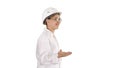 Young scientist in lab coat and hardhat walking and saying somet