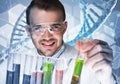 Young scientist mixing reagents in glass flask in clinical laboratory Royalty Free Stock Photo