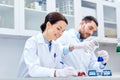 Young scientists making test or research in lab Royalty Free Stock Photo