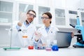 Young scientists making test or research in lab Royalty Free Stock Photo