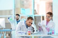 Young scientists working in laboratory. Chemical