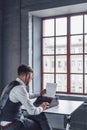 Young screenwriter by the window Royalty Free Stock Photo