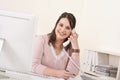 Young secretary on phone at modern office Royalty Free Stock Photo