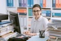 Young secretary working and smiling Royalty Free Stock Photo