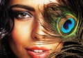 Young sensitive brunette woman with peacock feather eyes close u Royalty Free Stock Photo