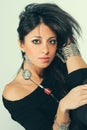 Young sensual italian woman with accessories. Black hair Royalty Free Stock Photo