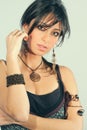 Young sensual italian woman with accessories. Black hair Royalty Free Stock Photo