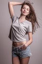 Young sensual model girl pose in studio. Royalty Free Stock Photo