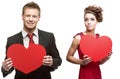 Young sensual woman and handsome man holding red heart on white Royalty Free Stock Photo