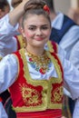 Young serbian dancer girl in traditional costumes