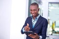 Young businessman showing his thumb while having a video call using a digital tablet while smiling Royalty Free Stock Photo