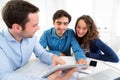 Young serious couple meeting a real estate agent Royalty Free Stock Photo