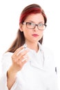 Young serious female doctor holding a syringe with needle Royalty Free Stock Photo