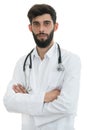 Young serious handsome bearded doctor with white coat and stethoscope. Royalty Free Stock Photo