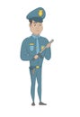 Young serious hispanic policeman with baton.