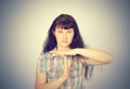 Young serious woman showing time out gesture with hands Royalty Free Stock Photo