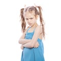 Young seven years old brunette girl in blue dress on a white iso