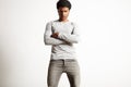 Young black model wearing light gray longsleeve t-shirt