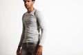 Young black model wearing light gray longsleeve t-shirt