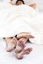 young couples in bed Royalty Free Stock Photo