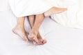 Young couples in bed Royalty Free Stock Photo