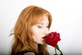 Young elegant woman with red rose Royalty Free Stock Photo