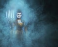 A young and lady vampire holding candles Royalty Free Stock Photo