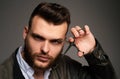 Young sexy man, portrait of guy with barber scissors for barber shop. Modern barbershop, shaving. Handsome male with Royalty Free Stock Photo