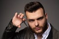 Young sexy man, portrait of guy with barber scissors for barber shop. Modern barbershop, shaving. Handsome male with Royalty Free Stock Photo