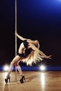 Young pole dance woman Royalty Free Stock Photo