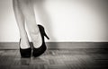 Young woman feet with black high heels and legs, close up Royalty Free Stock Photo