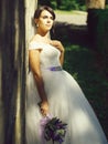 Pretty bride with flower bouquet Royalty Free Stock Photo