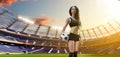 Young woman player in soccer stadium