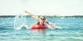 Young sexy woman swimming on paddle board.Water sports , active lifestyle. Royalty Free Stock Photo