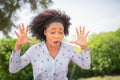 Young shocked woman looking down with a surprised expression on her face. Royalty Free Stock Photo