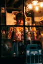 Young Shopworker working behind window in York