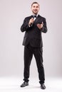 Young Showman presenter with microphone against white background.