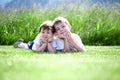 Young siblings on grass Royalty Free Stock Photo