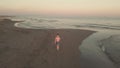 Young sister and brother who are playing in the sea