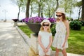 Young sisters exploring the picturesque resort town Bolsena, situated on the shores of Italy`s largest lake, Lago Bolsena, Italy Royalty Free Stock Photo