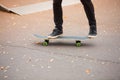 Young skate boy doing trick in skating park outdoors. Sport concept. Royalty Free Stock Photo