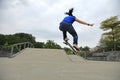 Young skateboarder practice ollie trick